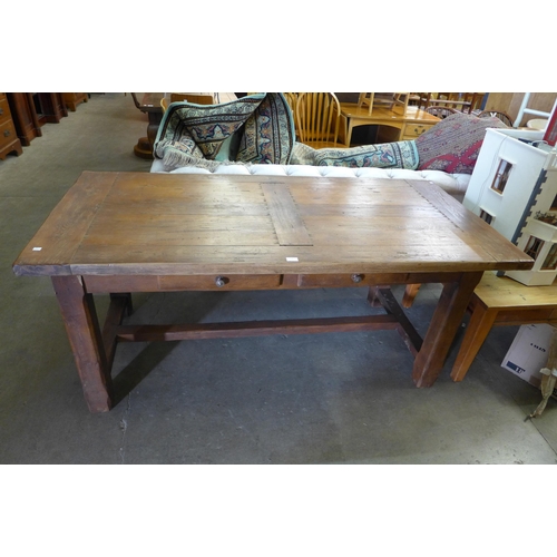 196 - A French style oak two drawer farmhouse refectory table