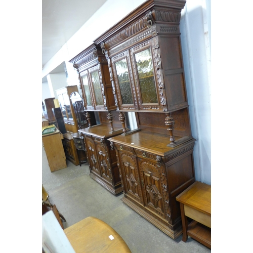 197 - A pair of 19th Century French Henry II style carved oak side cabinets