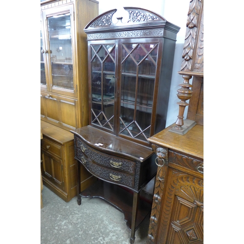 198 - An Edward VII Chippendale Revival carved mahogany serpentine side cabinet