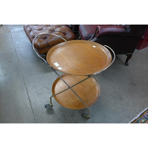 20 - A Swedish Ary Fanerprodukter teak and chrome two tier circular cocktail trolley