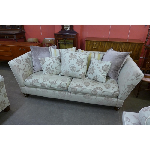 200 - A fabric upholstered Knole drop-arm settee and pair of matching armchairs