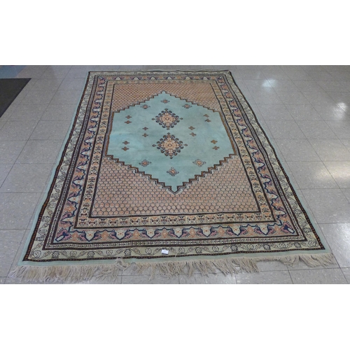 201 - An eastern turquoise ground rug