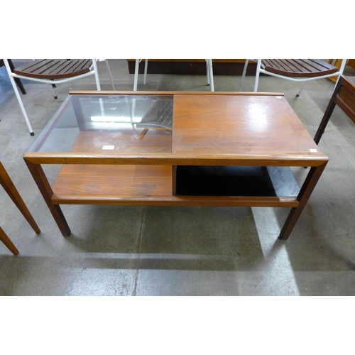 23 - A McIntosh teak and glass topped rectangular two tier coffee table