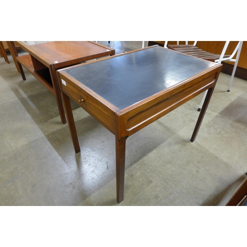 24 - A Danish rosewood and black laminated single drawer lamp table, CITES A10 no. 630306/01