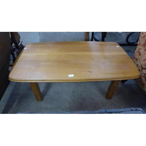 245 - A light elm coffee table