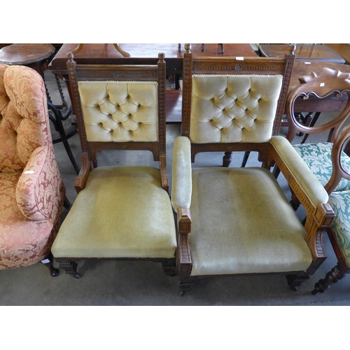 247 - A pair of Victorian Aesthetic Movement carved oak and green fabric upholstered lady's and gentleman'... 