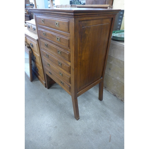 261 - An Edward VII style hardwood chest of drawers