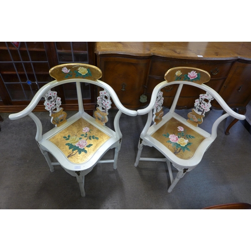 265 - A pair of Chinese cream and gold lacquered chinoiserie corner chairs