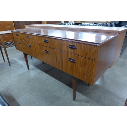 27 - An afromosia sideboard