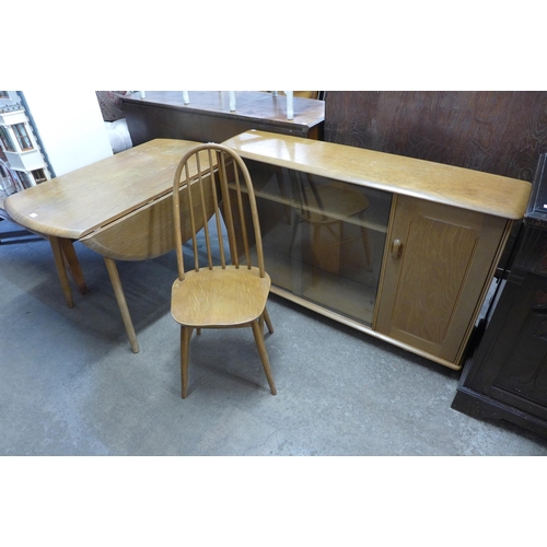 271 - A Priory oak drop-leaf table, a chair and bookcase