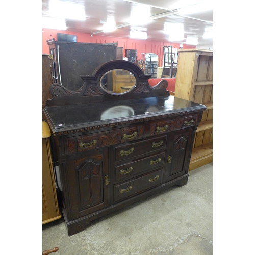 273 - An Art Nouveau carved mahogany mirrorback sideboard