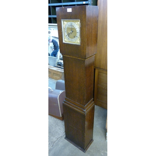 302 - An Art Deco oak dwarf longcase clock