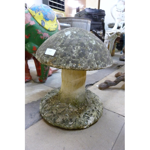 323 - A concrete garden toadstool ornament