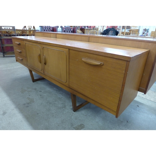 33 - A teak sideboard