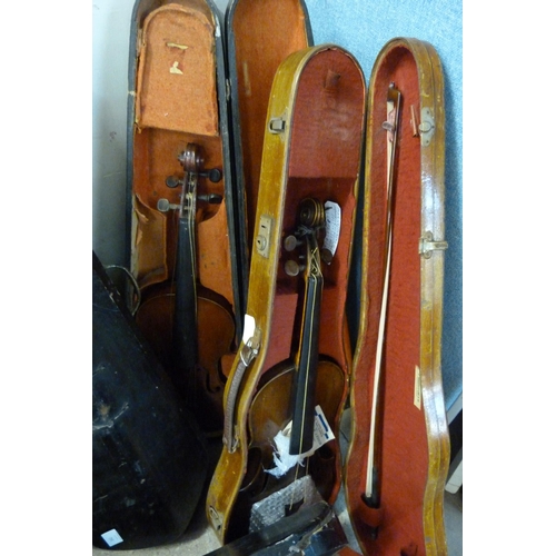 342 - Nine cased violins