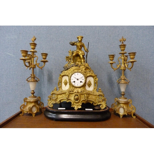 364 - A 19th Century French gilt metal and alabaster clock garniture