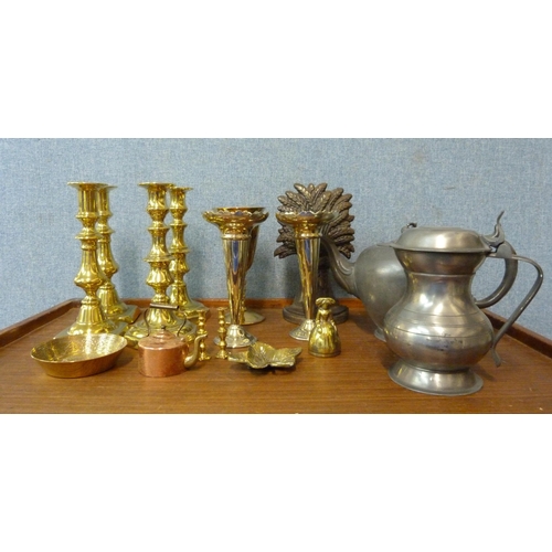 377 - Metalware including two pairs of brass candlesticks, a door stop, a gold plated goblet, a pair of va... 