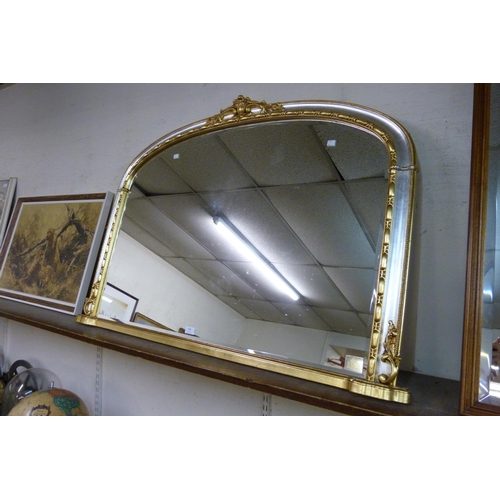 389 - A gilt framed overmantle mirror