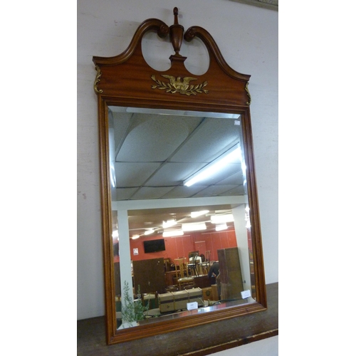 390 - A George II style walnut and gilt mounted wall hanging mirror