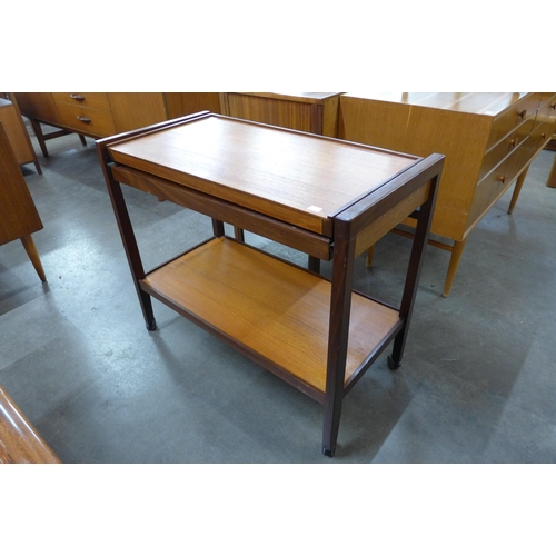 40 - A teak metamorphic trolley