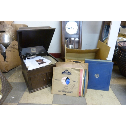 417 - An early 20th Century oak H.M.V. gramophone no. 103 with records