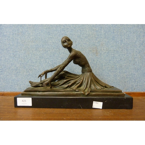 421 - An Art Deco style bronze figure of a ballerina, on black marble socle