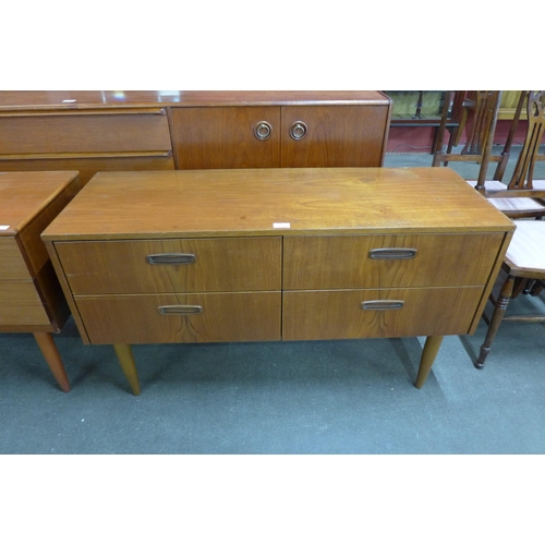 43 - A small teak sideboard