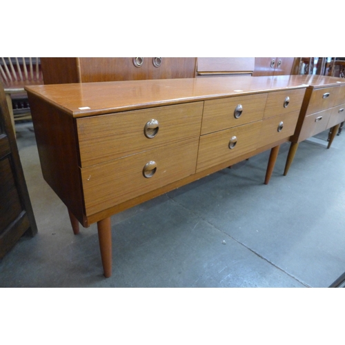 44 - A small teak sideboard