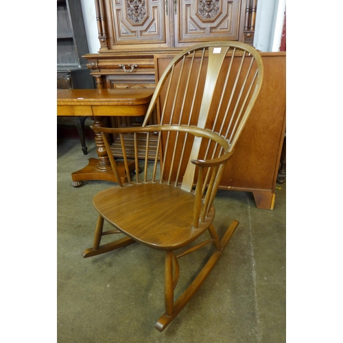 47 - An Ercol Golden Dawn elm and beech Chairmakers rocking chair