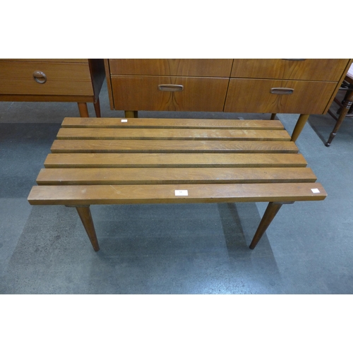 54 - A teak slatted top rectangular coffee table