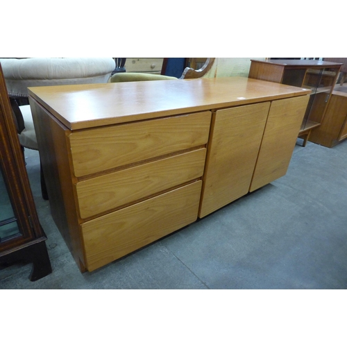 60 - A teak media unit