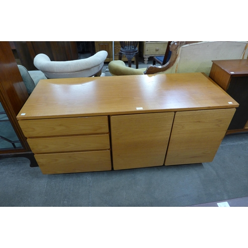 60 - A teak media unit