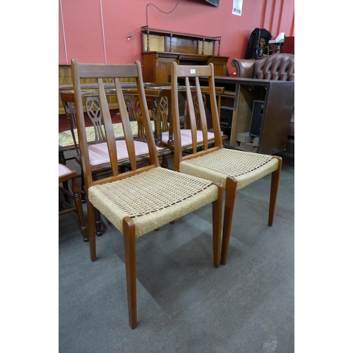 64 - A pair of Danish BRDR Furbo teak and paper cord seated chairs