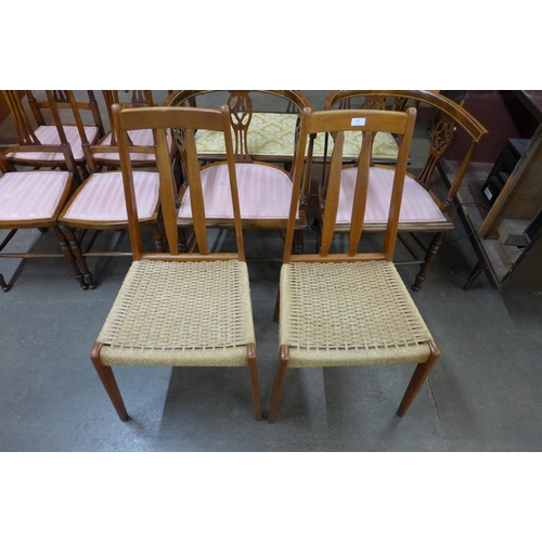 64 - A pair of Danish BRDR Furbo teak and paper cord seated chairs