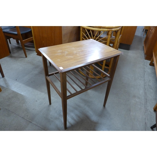 65 - A teak occasional table