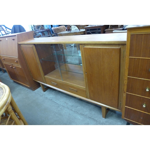 67 - A Jentique teak side cabinet