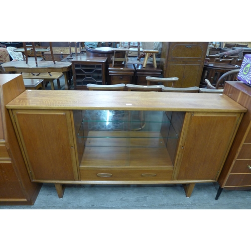 67 - A Jentique teak side cabinet