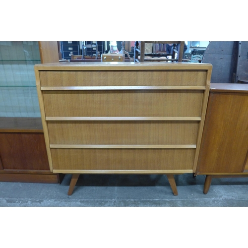 70 - An Avalon teak chest of drawers