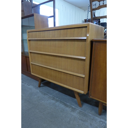 70 - An Avalon teak chest of drawers