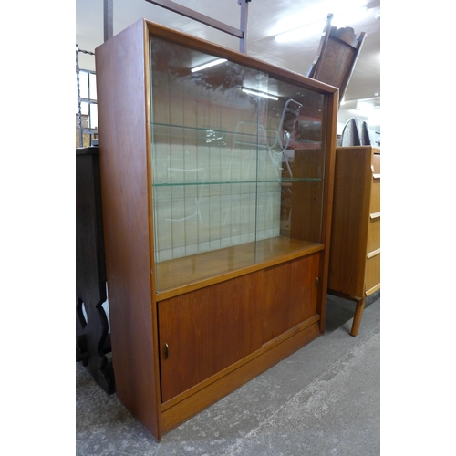 71 - A Herbert Gibbs teak display cabinet