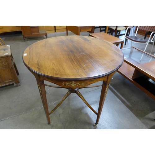 78 - A late Victorian circular rosewood and ivory inlaid centre table. This lot is sold with non-transfer... 