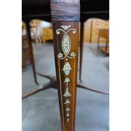 78 - A late Victorian circular rosewood and ivory inlaid centre table. This lot is sold with non-transfer... 