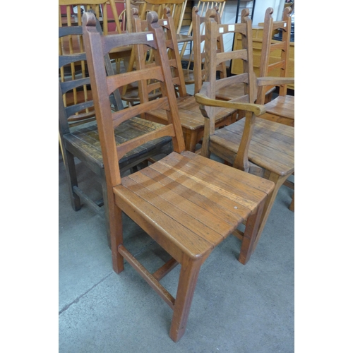 82 - A set of six Arts and Crafts oak chairs