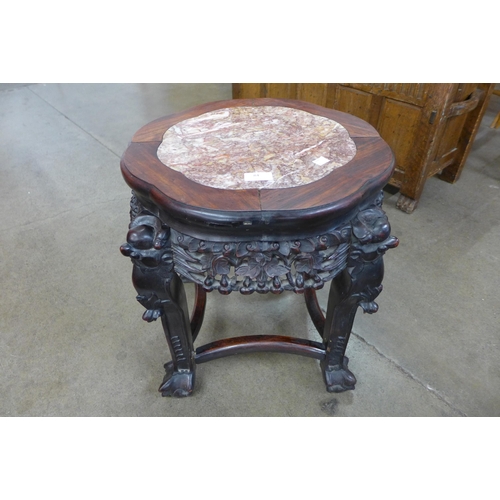 84 - A late 19th/early 20th Century Chinese rosewood and marble topped stand