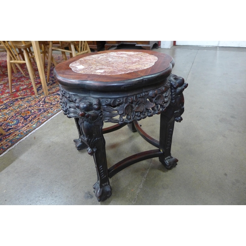 84 - A late 19th/early 20th Century Chinese rosewood and marble topped stand