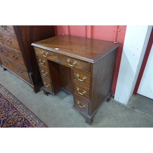 85 - A George III mahogany kneehole desk