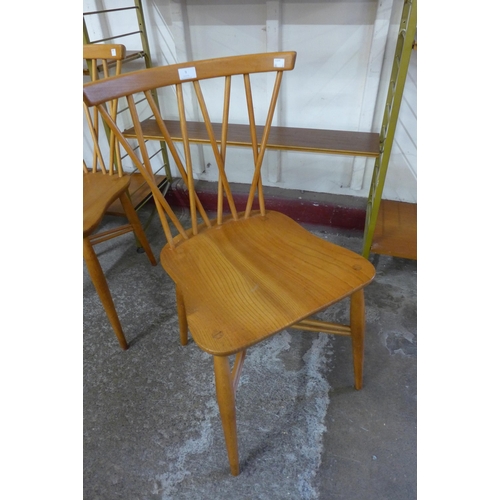 9 - A set of three Ercol Blonde elm and beech candlestick chairs