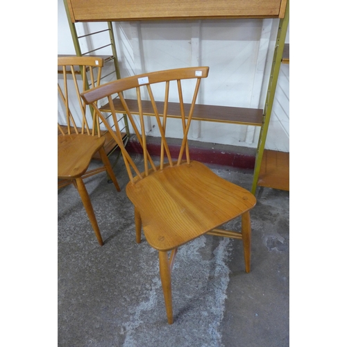 9 - A set of three Ercol Blonde elm and beech candlestick chairs