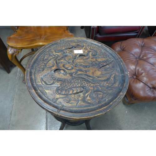 92 - A Liberty & Co. Arts and Crafts carved wood Japanese dragon pattern occasional table