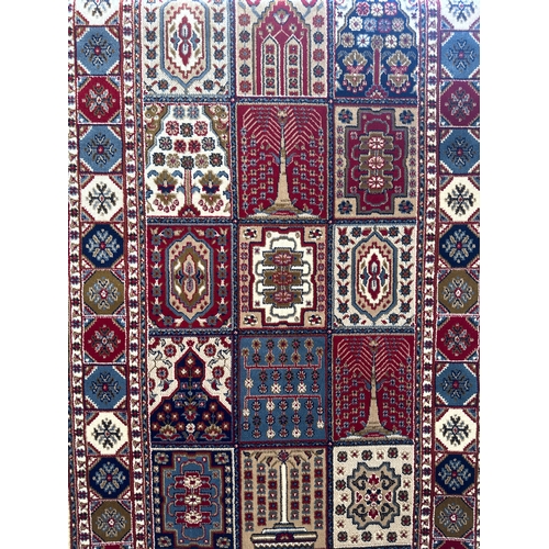 1515 - An ivory ground Cashmere runner, with Persian panel design, 300 x 80cm